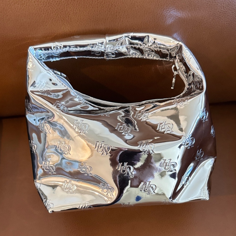 Huda Beauty Metallic Silver Shoulder Bag with Monogram Detail